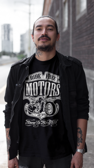 tattooed-man-wearing-a-tshirt-mockup-and-a-black-jacket-while-walking-on-the-street-a17080